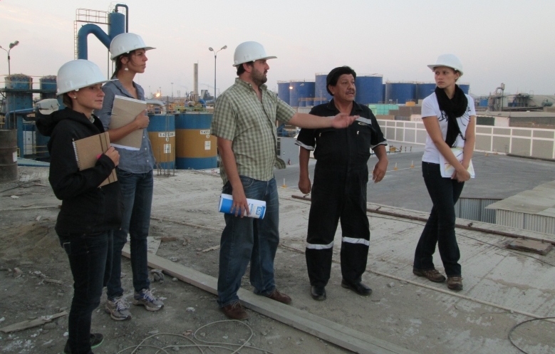 Students taking a tour of a processing plant.